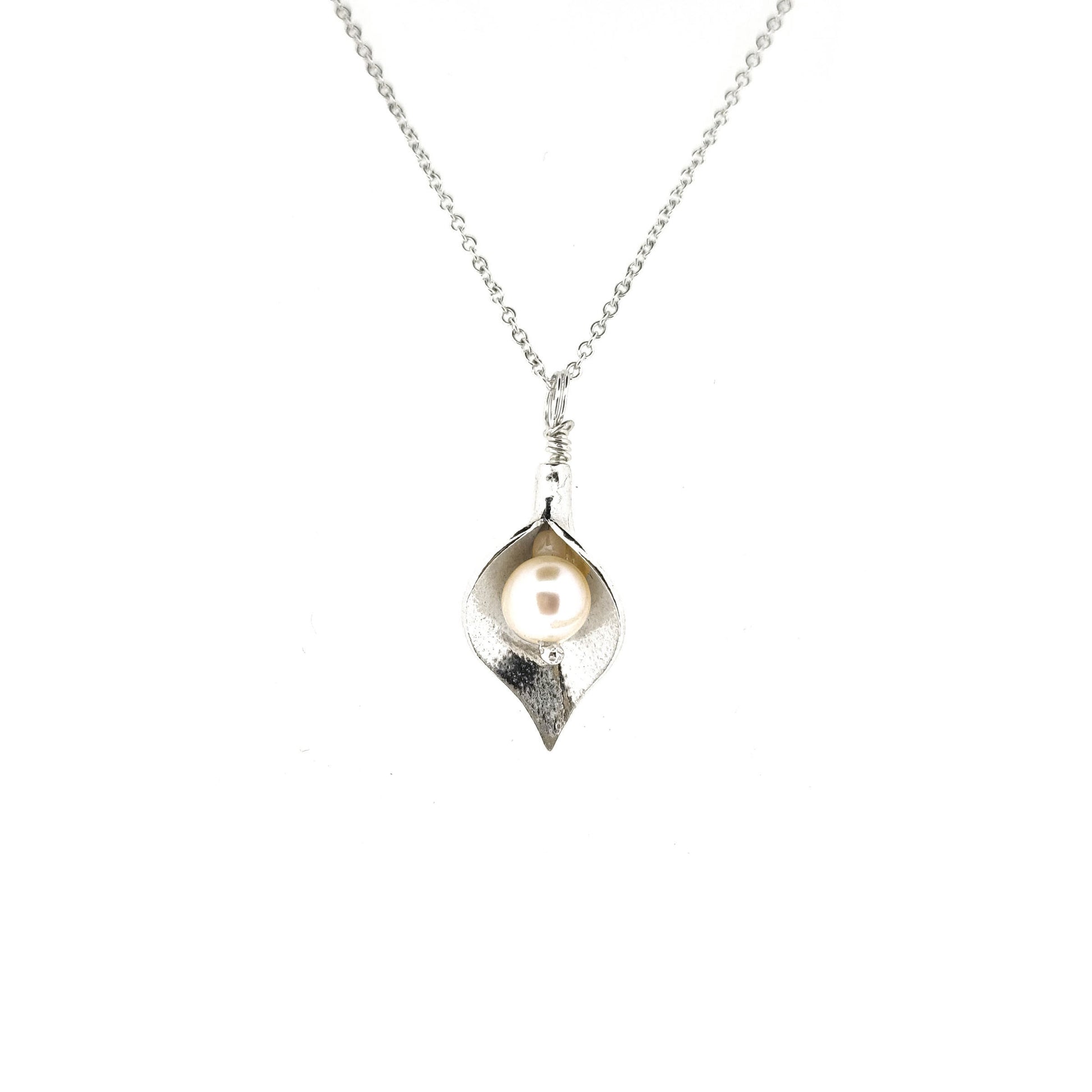 Silver calla lily pendant with central white pearl on silver chain - medium