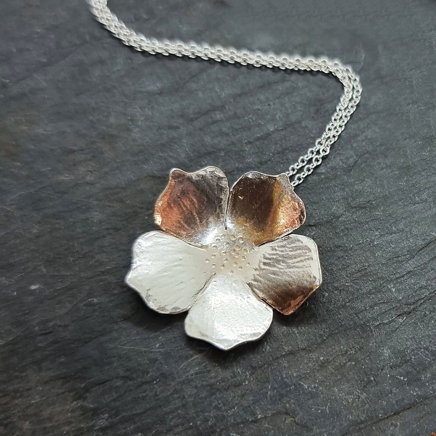A silver 5 petal flower pendant on silver chain - large