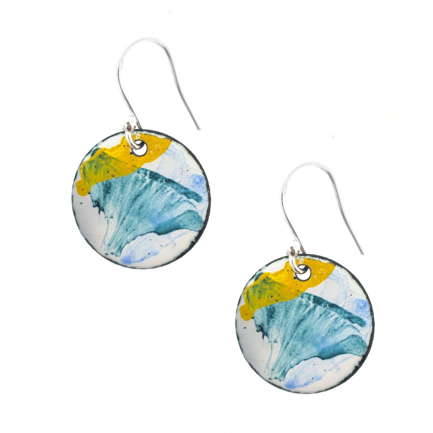 Round enamel drop earrings with splashes of blue, green and yellow on a white background. On silver ear hooks.