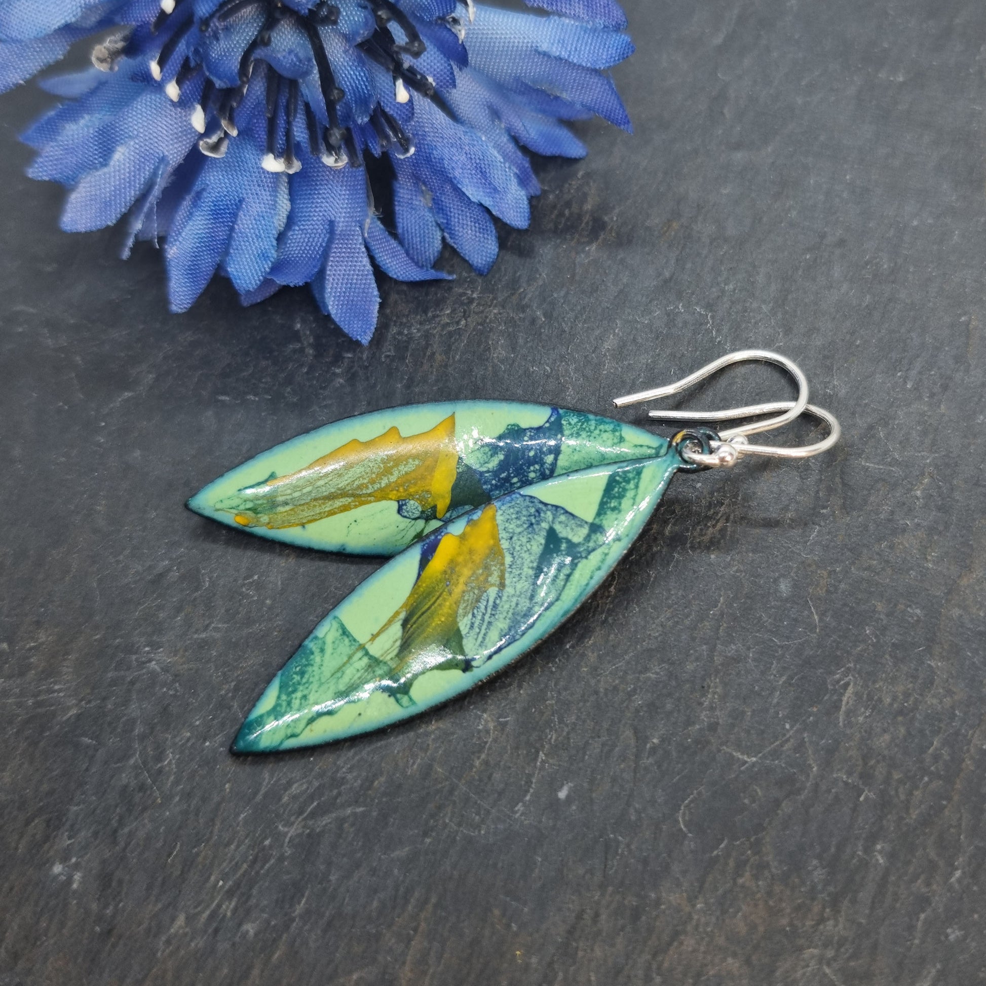 Navette shaped enamel drop earrings in green, blue and yellow with flower