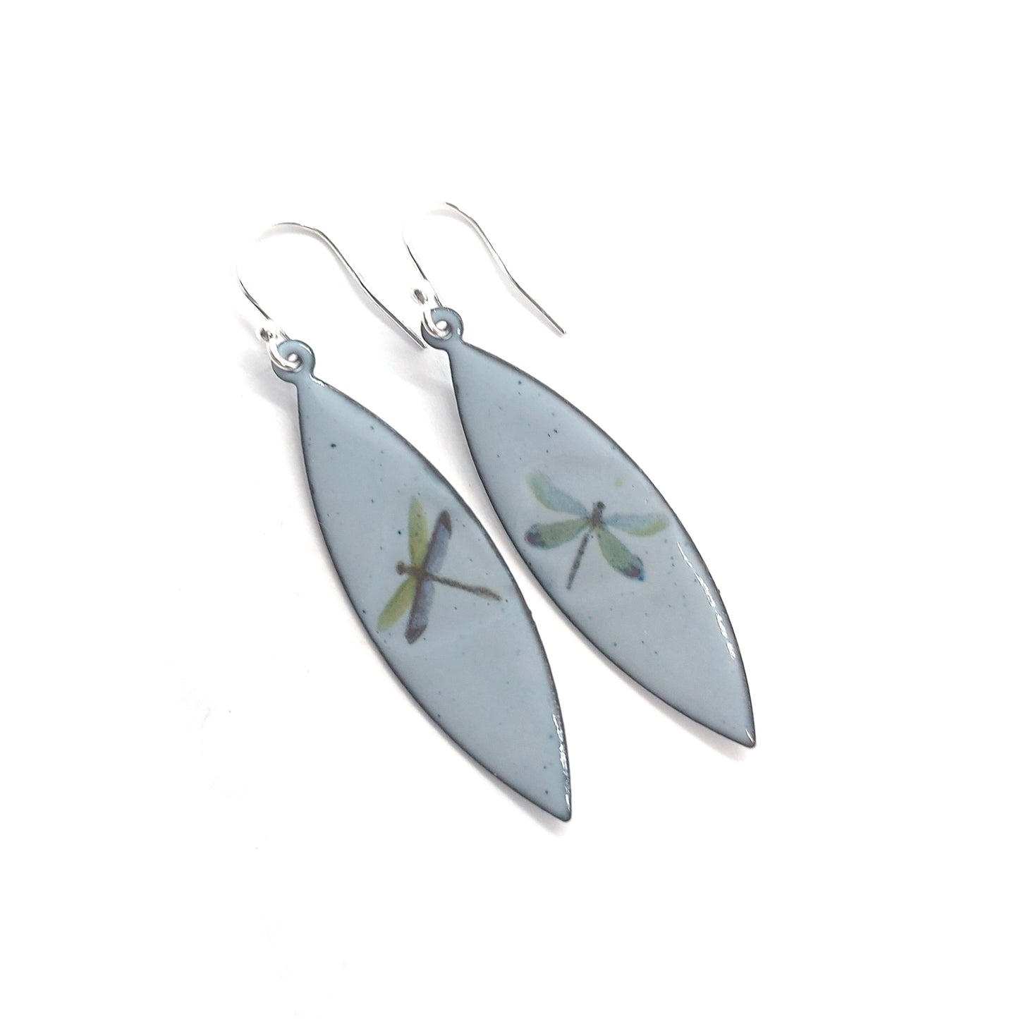 Boat shaped drop earrings with grey enamel. Each earring features one dragonfly in various colours. On silver ear hooks.