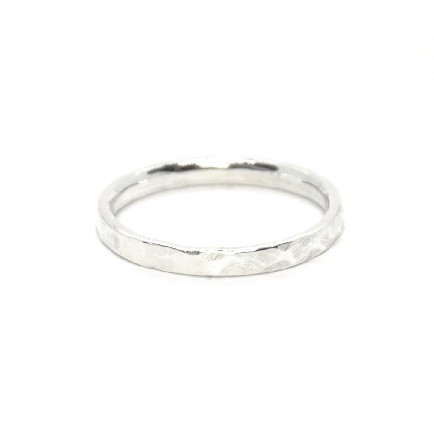 Silver hammered band ring.