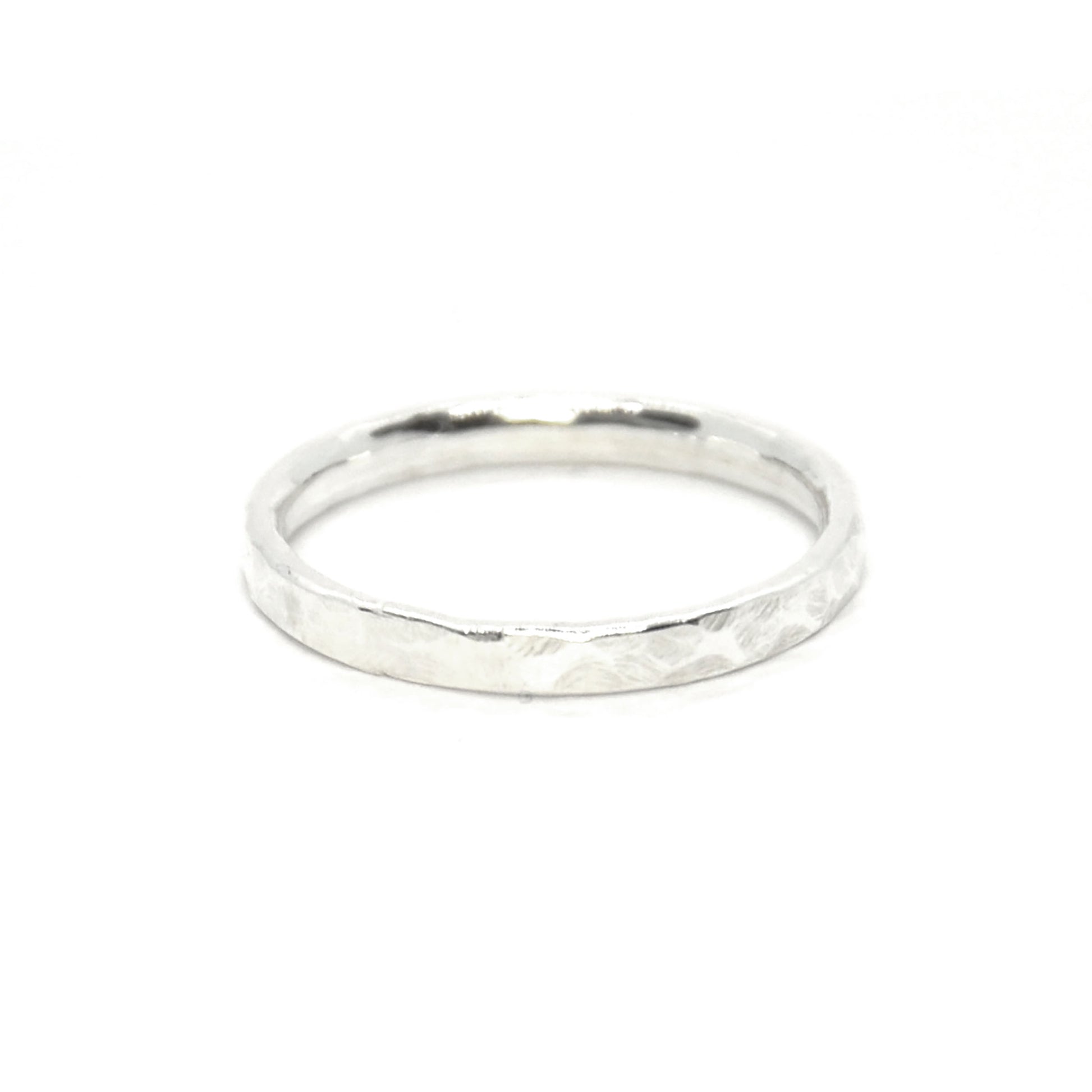 Silver hammered band ring.