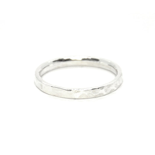 Silver hammered band ring.