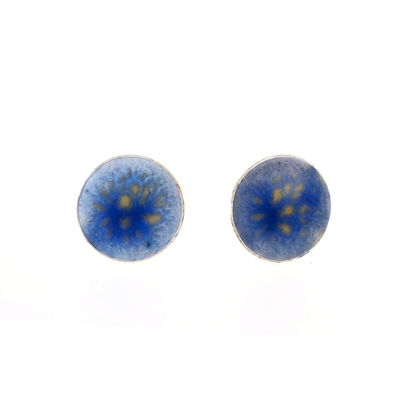 Round silver stud earrings with a blue and white enamel speckled pattern.