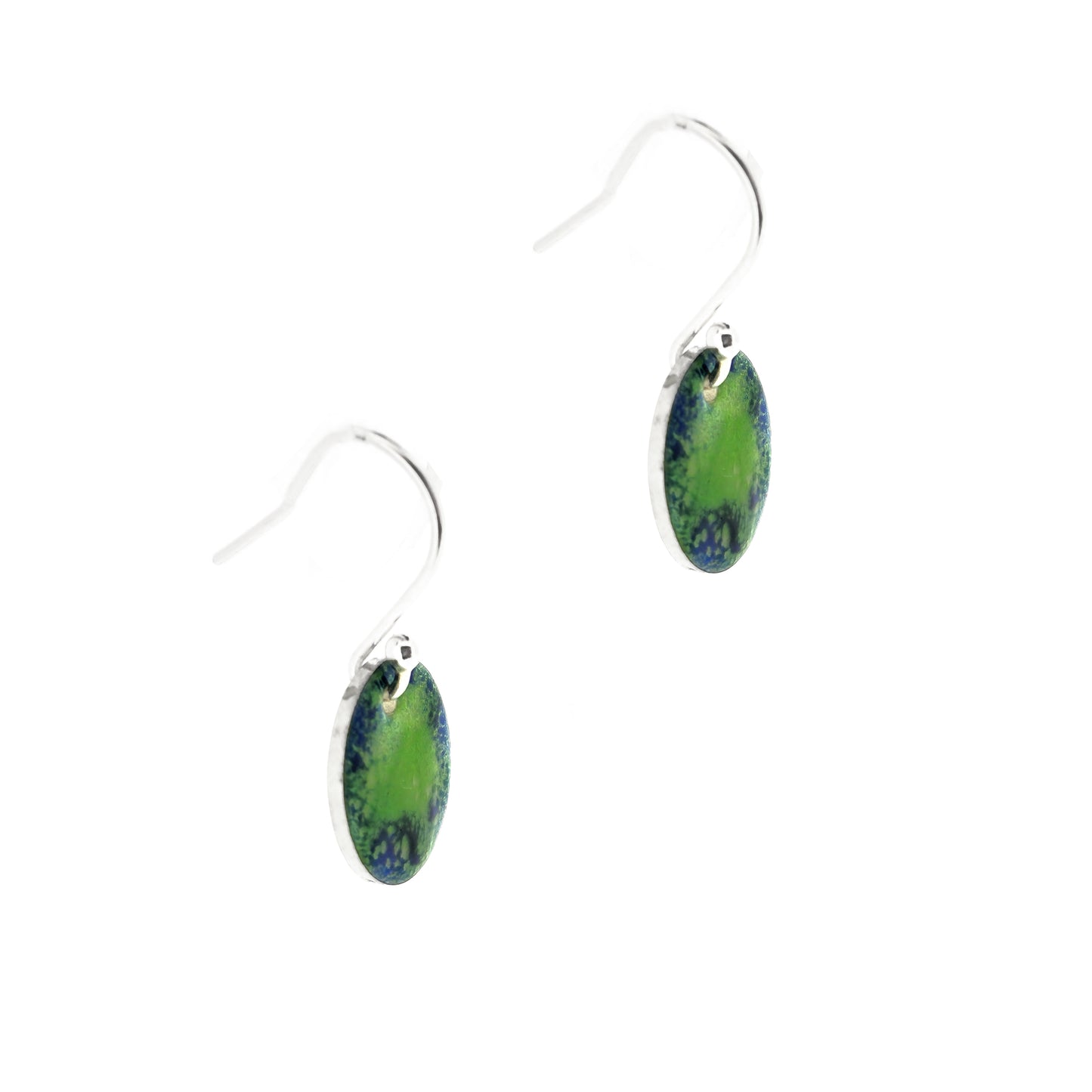 Silver earrings featuring a disc coloured with a pattern of green and blue enamel on silver ear hooks.