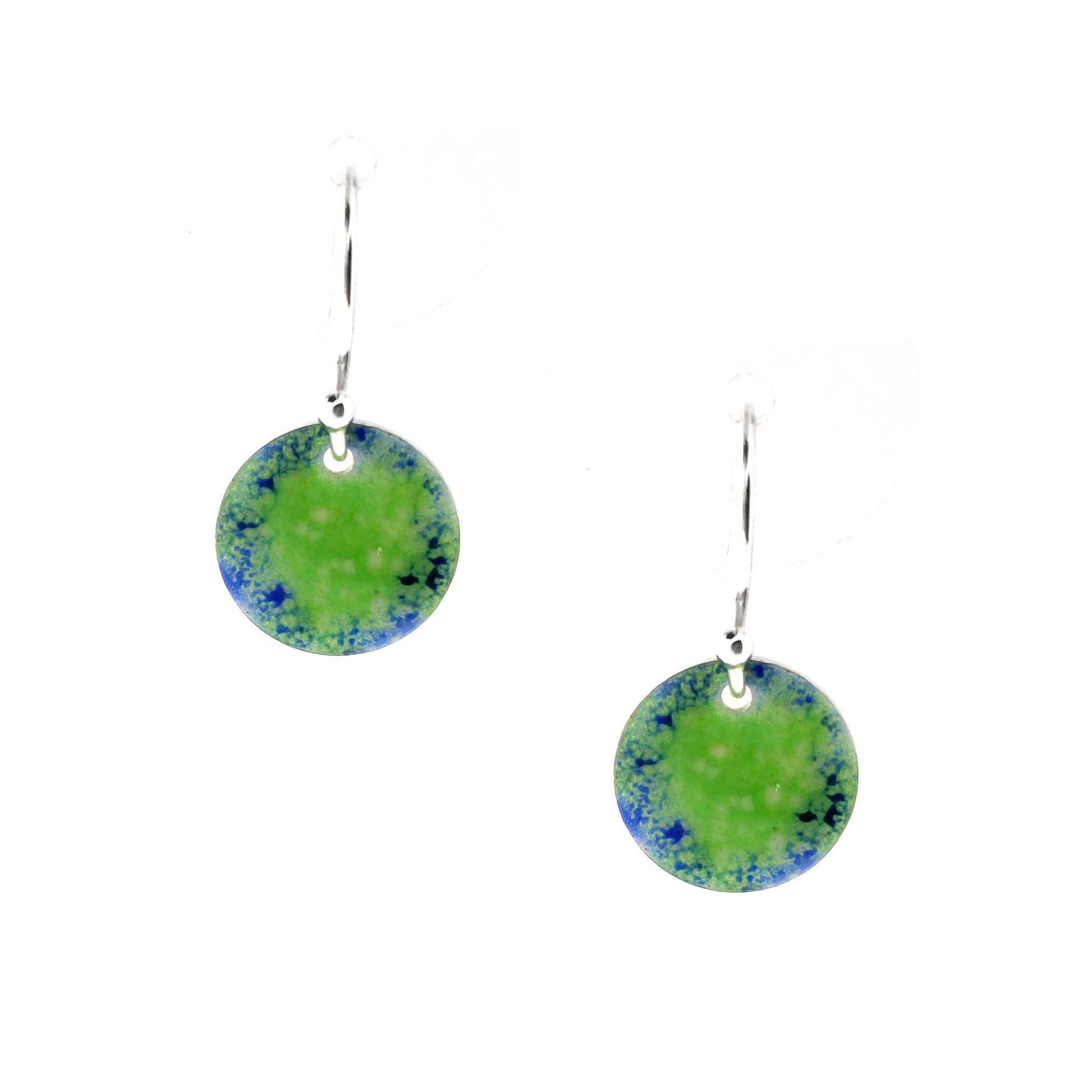 Silver earrings featuring a disc coloured with a pattern of green and blue enamel on silver ear hooks.