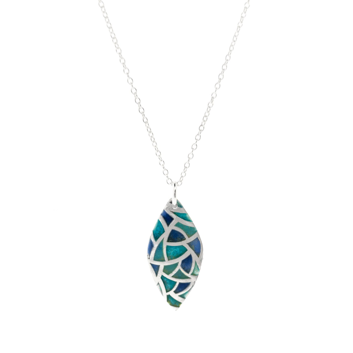 A marquise shaped silver pendant with geometric cells of blue, green and turquoise enamel. On a silver chain. Large.