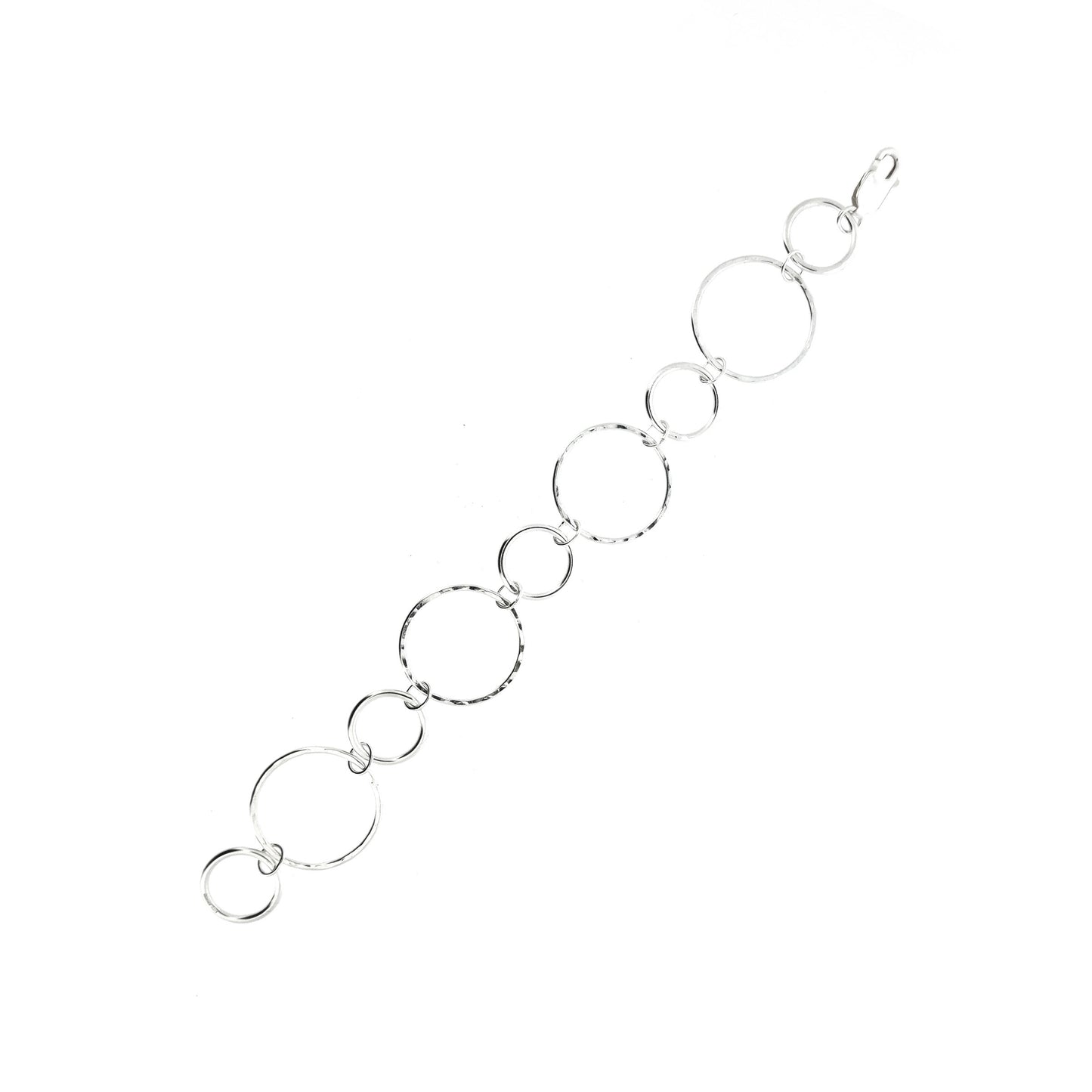 Silver chain link bracelet with 2 sizes of circles, one size has a hammered finish