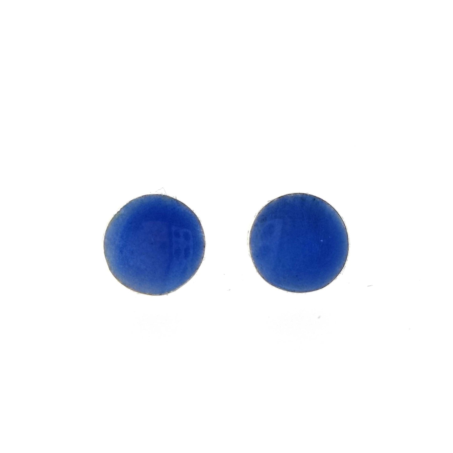 Round silver stud earrings with royal blue enamel.