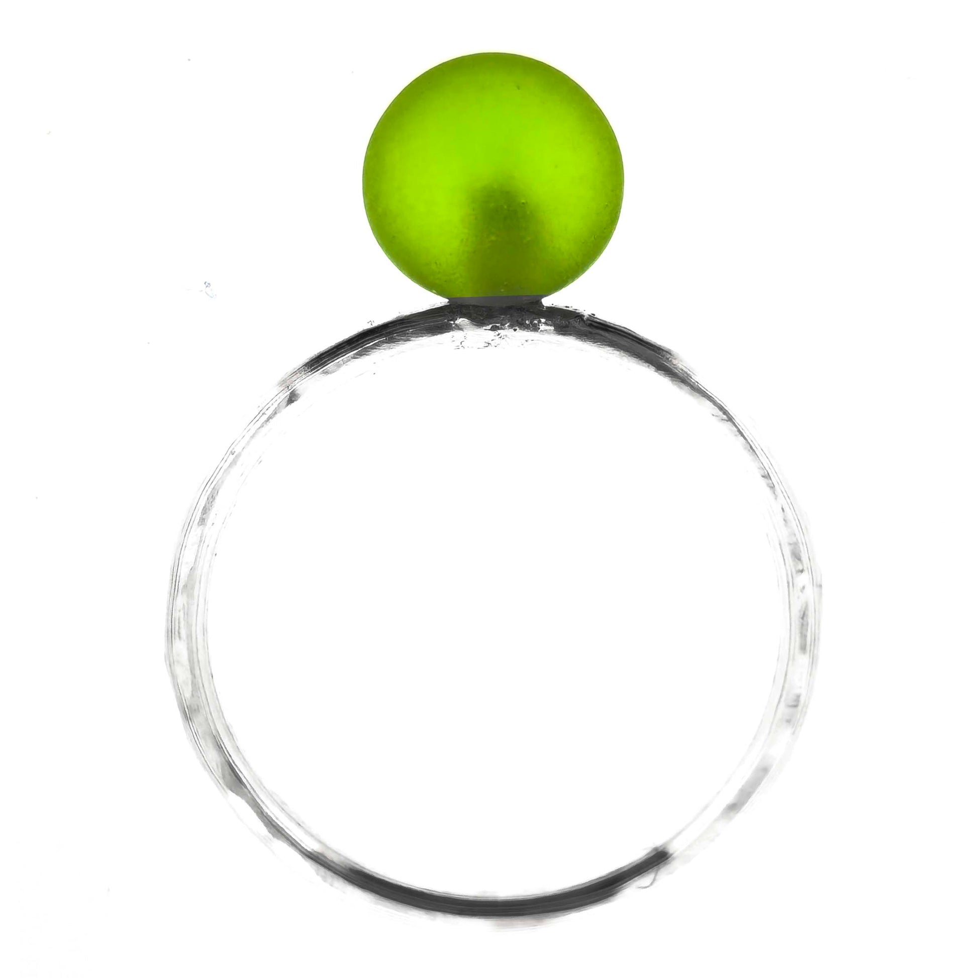 A silver stacking ring with a thin silver band with a hammered finish and a light green glass sphere at the top.