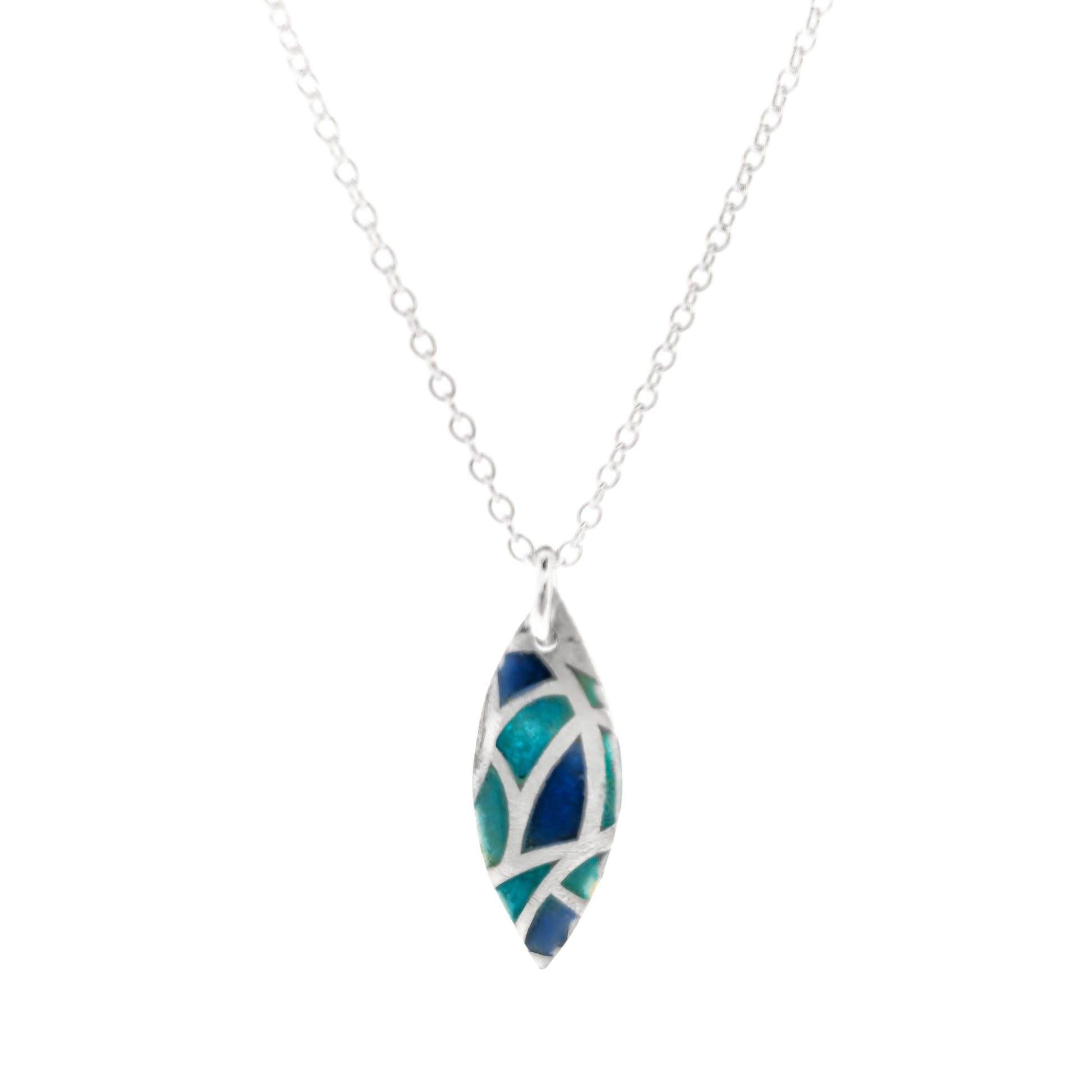 A marquise shaped silver pendant with geometric cells of blue, green and turquoise enamel. On a silver chain. Small.