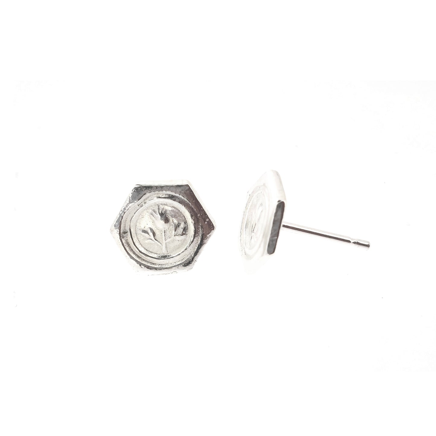 A pair of hexagon shaped sterling silver stud earrings with a thistle on them.