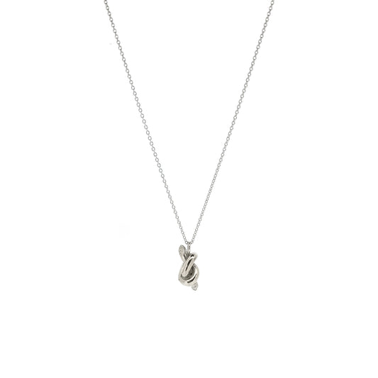Silver chain with a silver knot pendant.