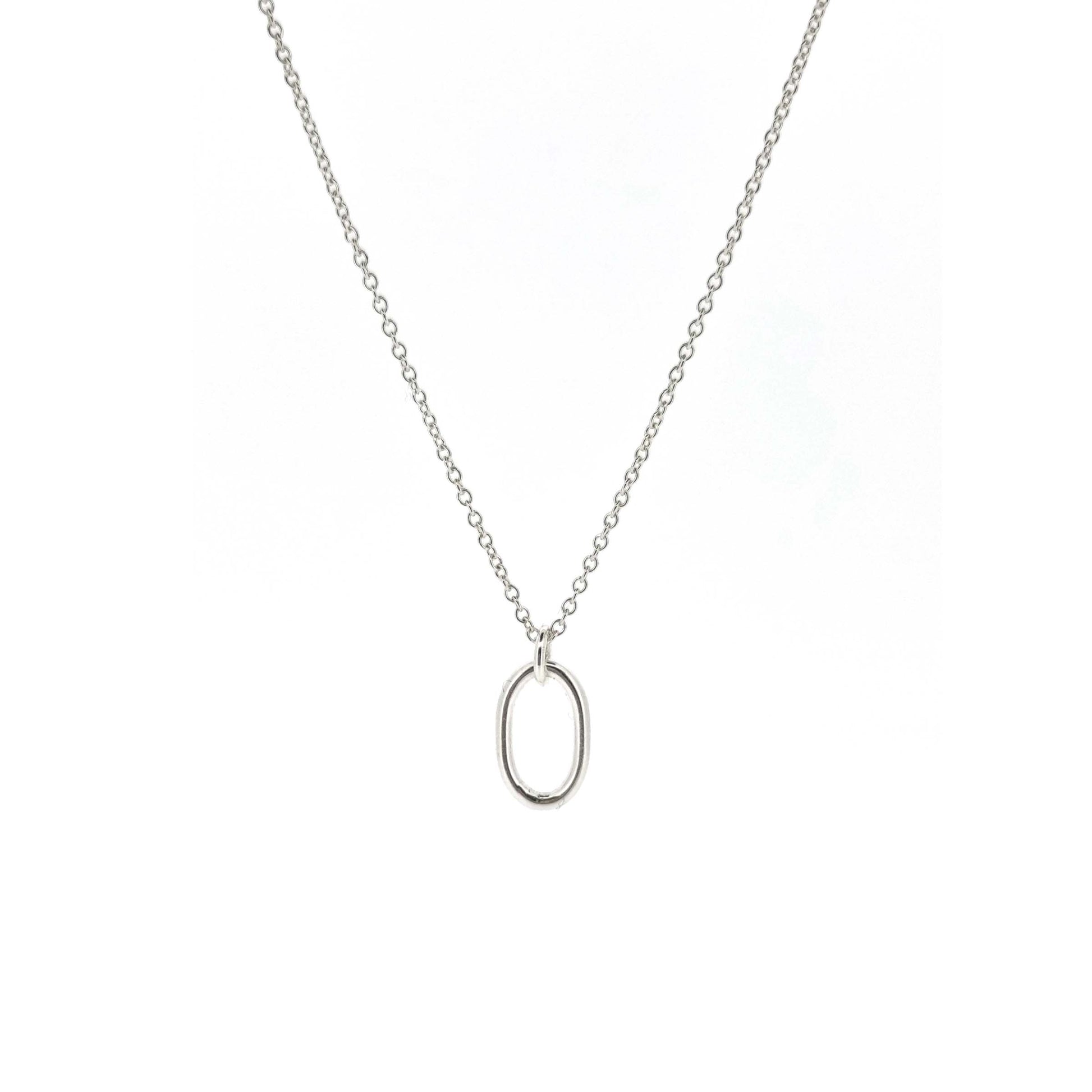 An open oblong pendant on a silver chain.