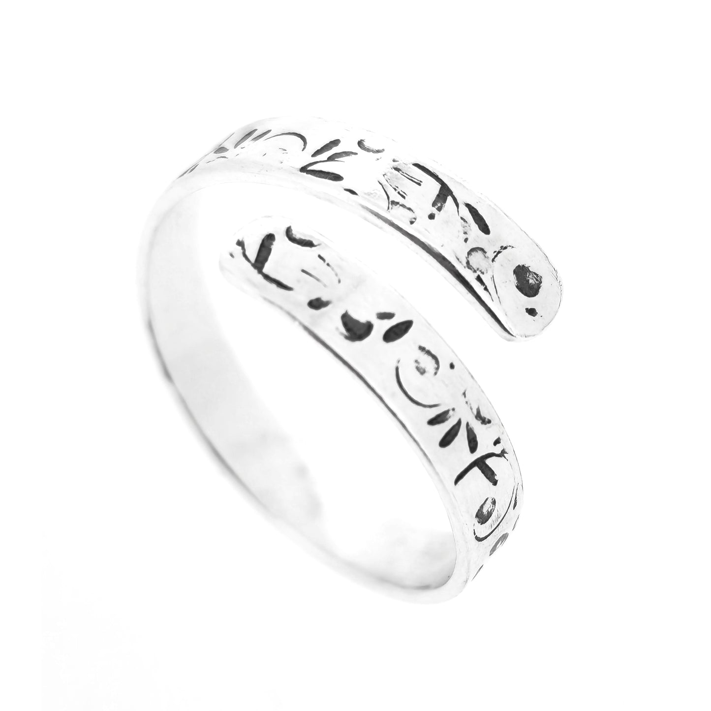 A handmade flat silver band wrap ring with leaf, bud and stalk pattern.