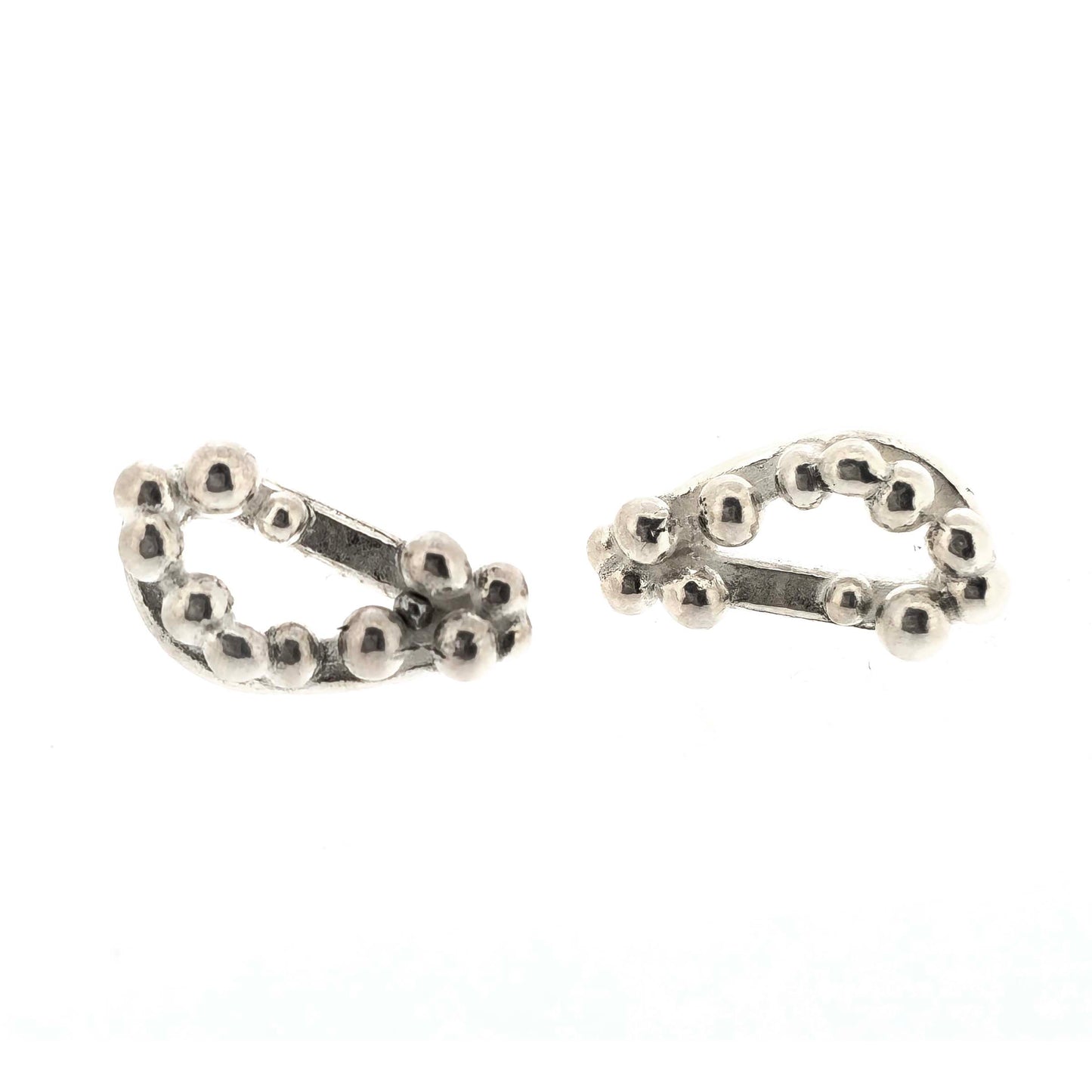 Silver asymmetric stud earrings with an open soft triangle shape and silver balls.