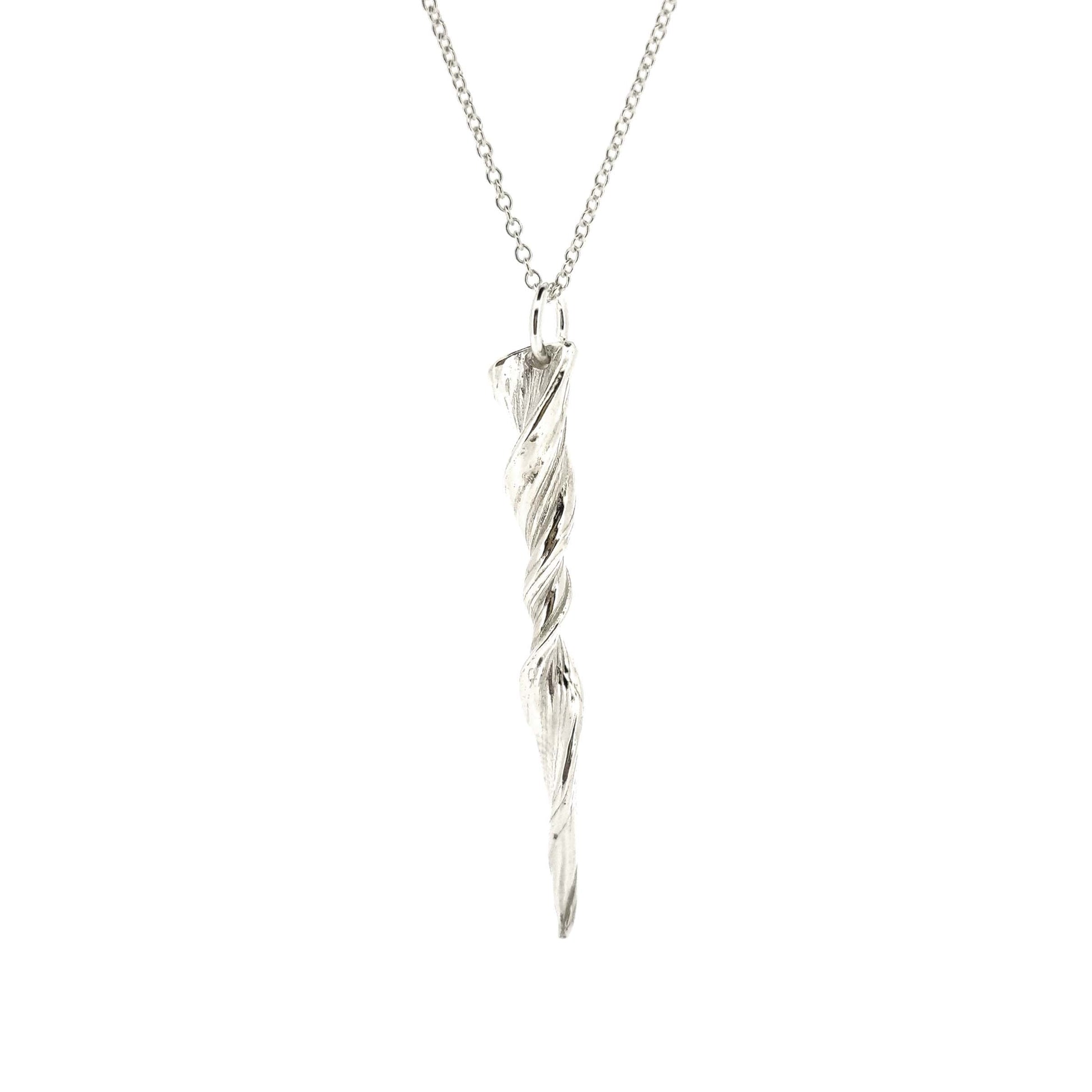 A silver twist pendant with line pattern on a silver chain.