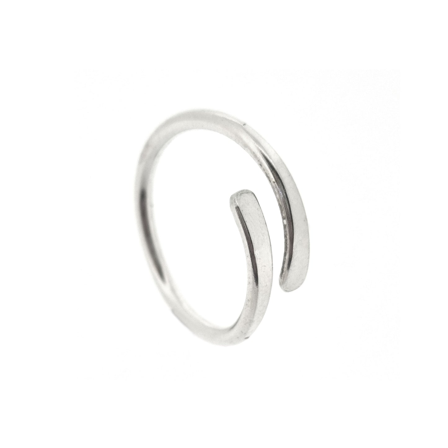 Silver cross over ring with flared & flattened ends.