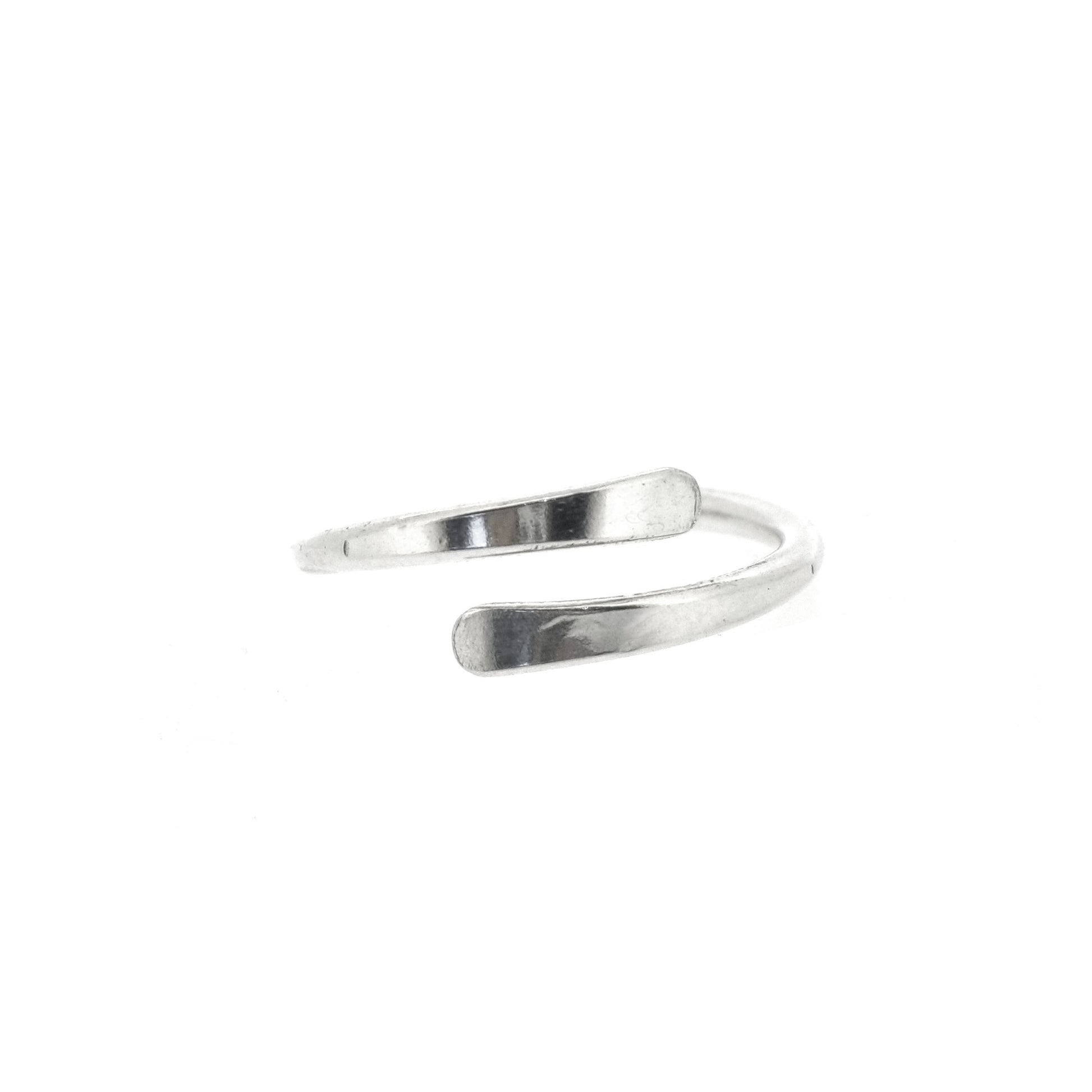 Silver cross over ring with flared & flattened ends.