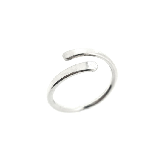 Silver cross over ring with flared & flattened ends.