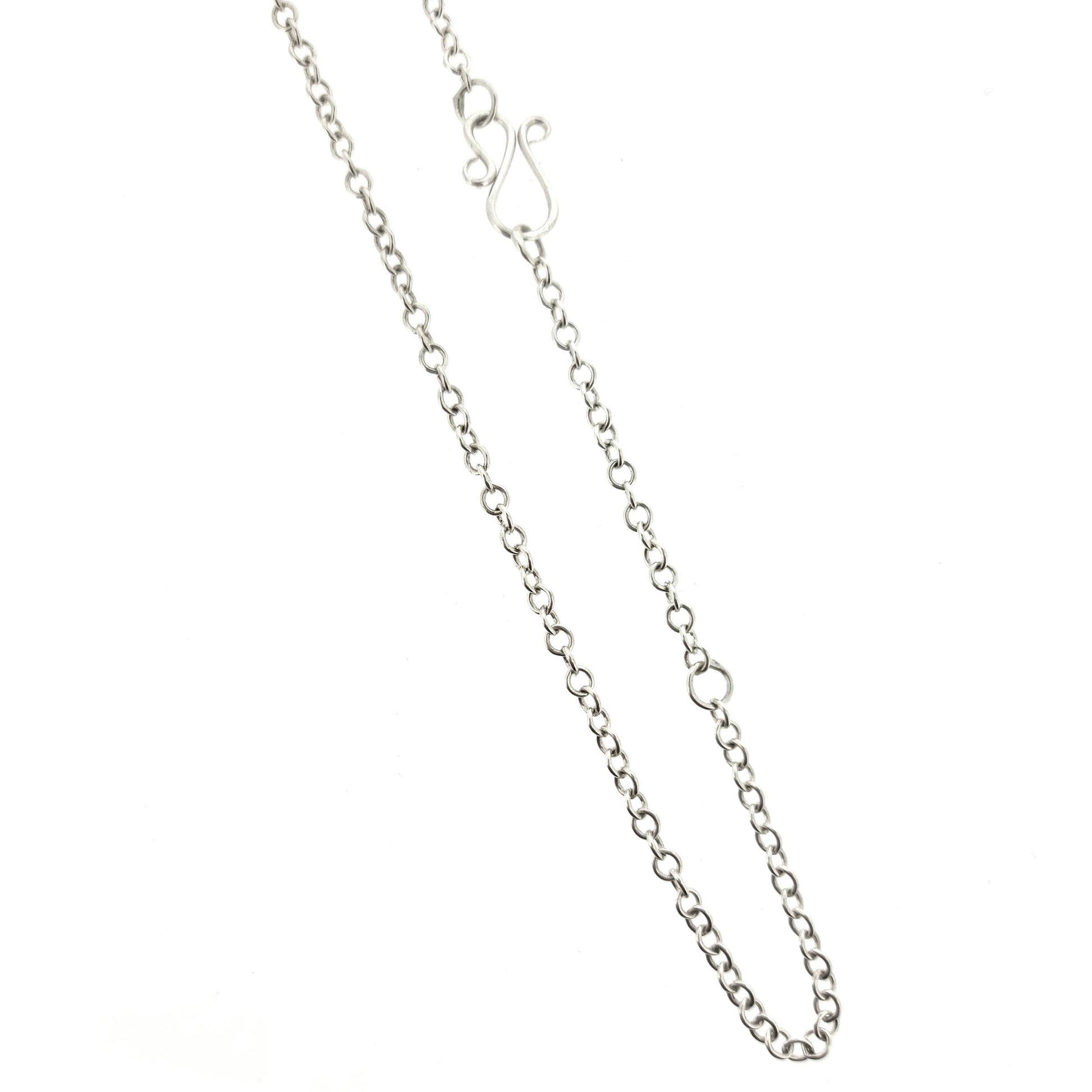 Silver chain with a handmade s-clasp and adjustable loop.