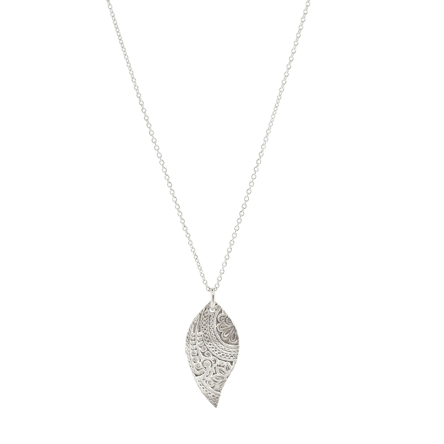 A silver asymmetric patterned leaf-shaped pendant on a chain