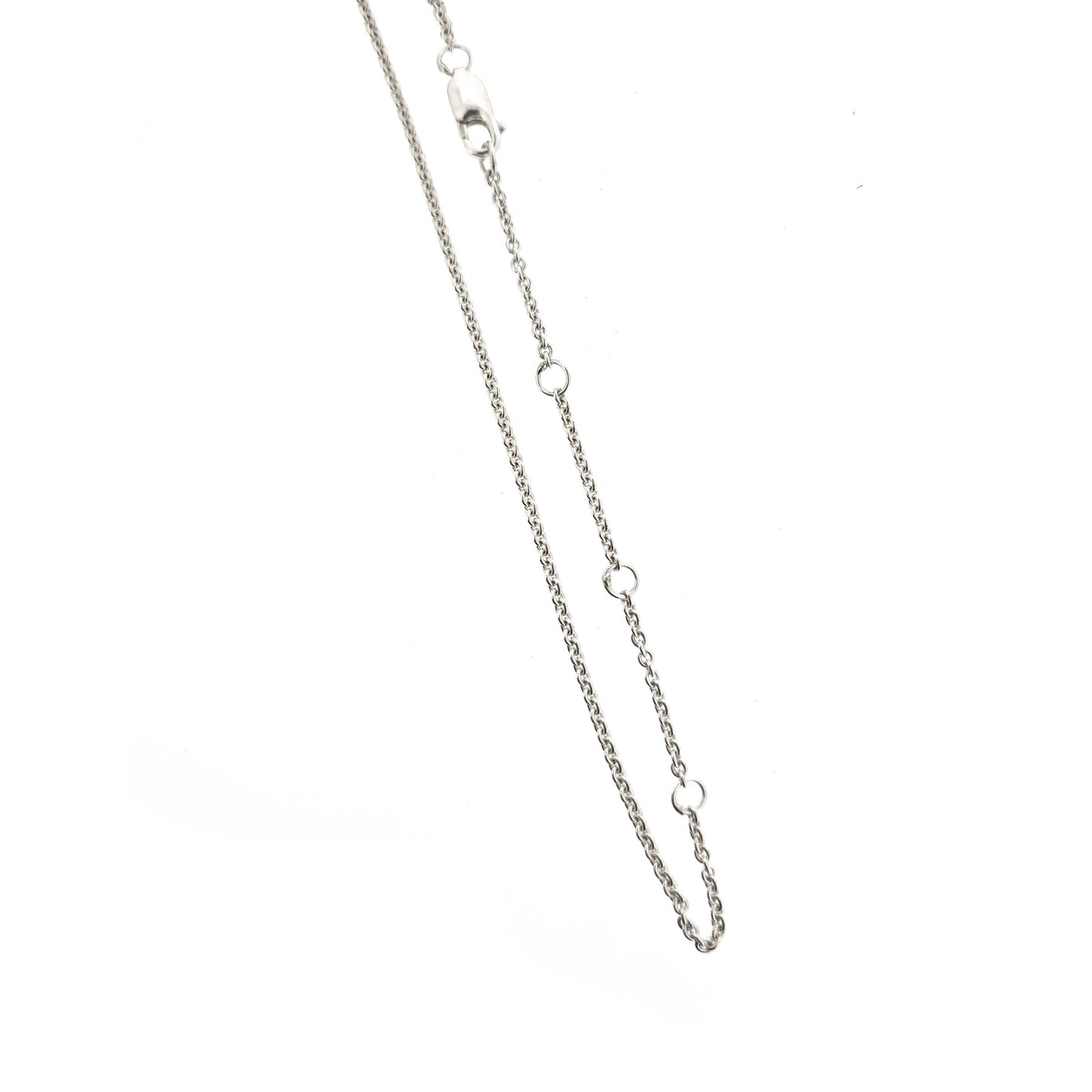 A silver chain necklace with adjustment loops.