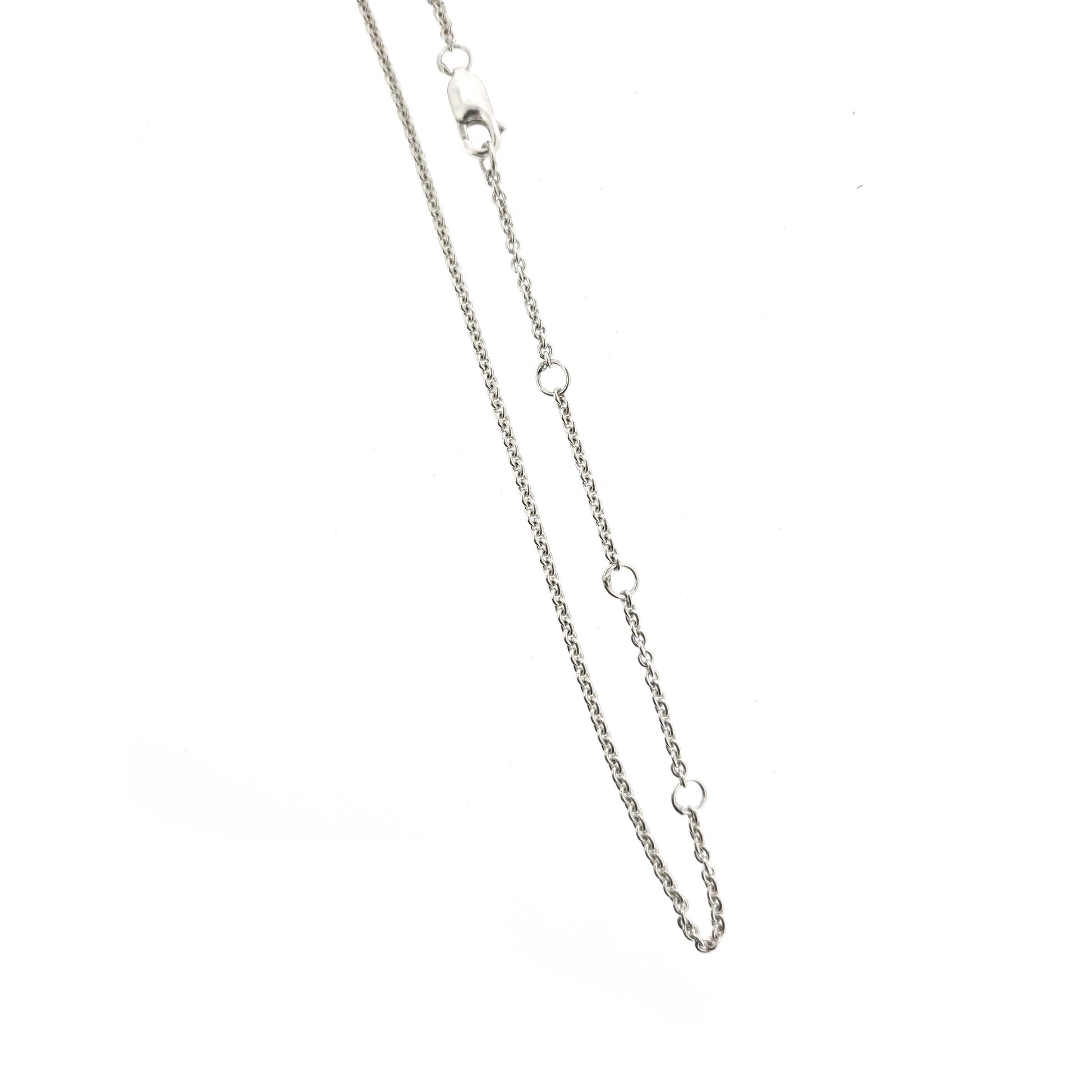 A silver chain necklace with adjustment loops.