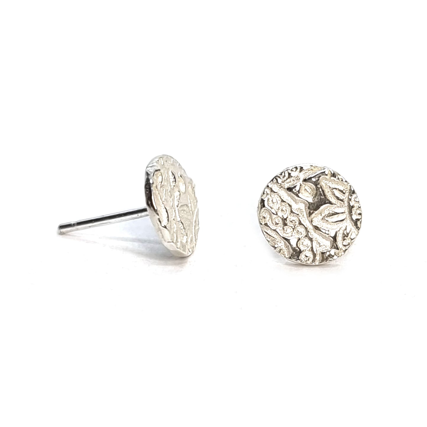Round silver stud earrings with pattern
