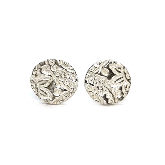 Round silver stud earrings with pattern