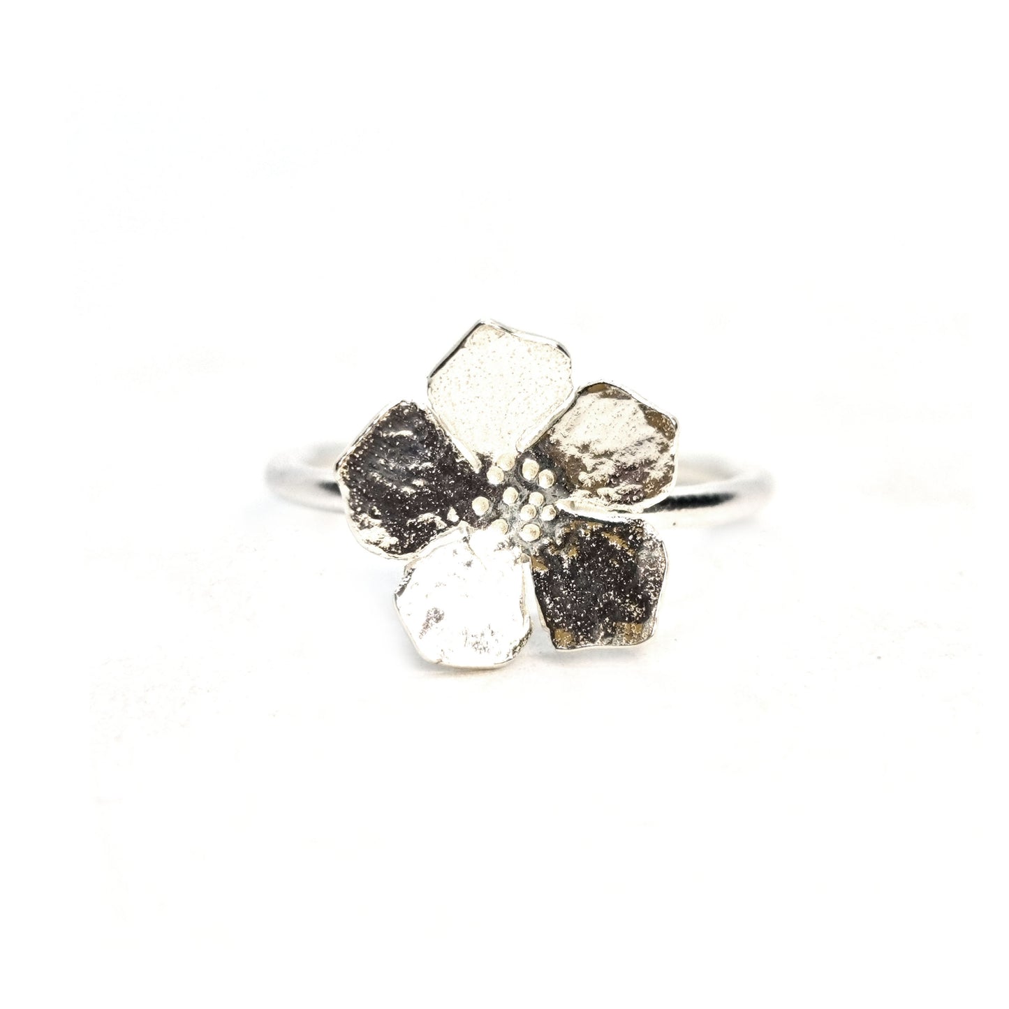 Silver 5 petal flower stacking ring.