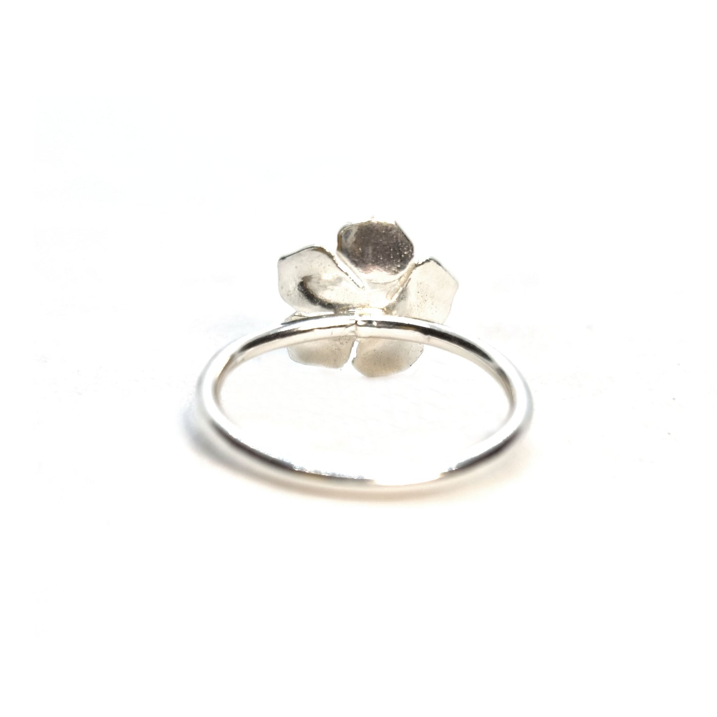 Silver 5 petal flower stacking ring.