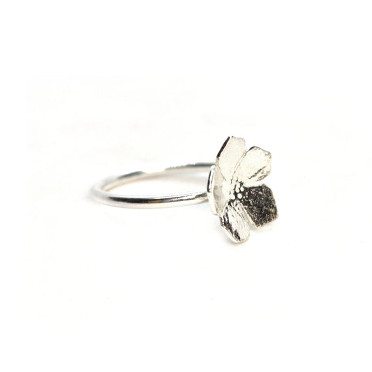Silver 5 petal flower stacking ring.