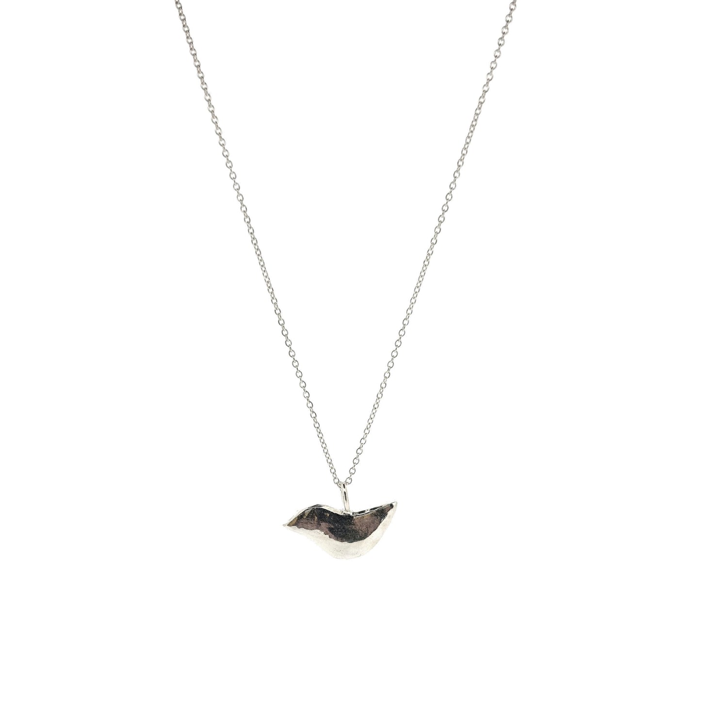 A silver stylised bird pendant on a silver chain.