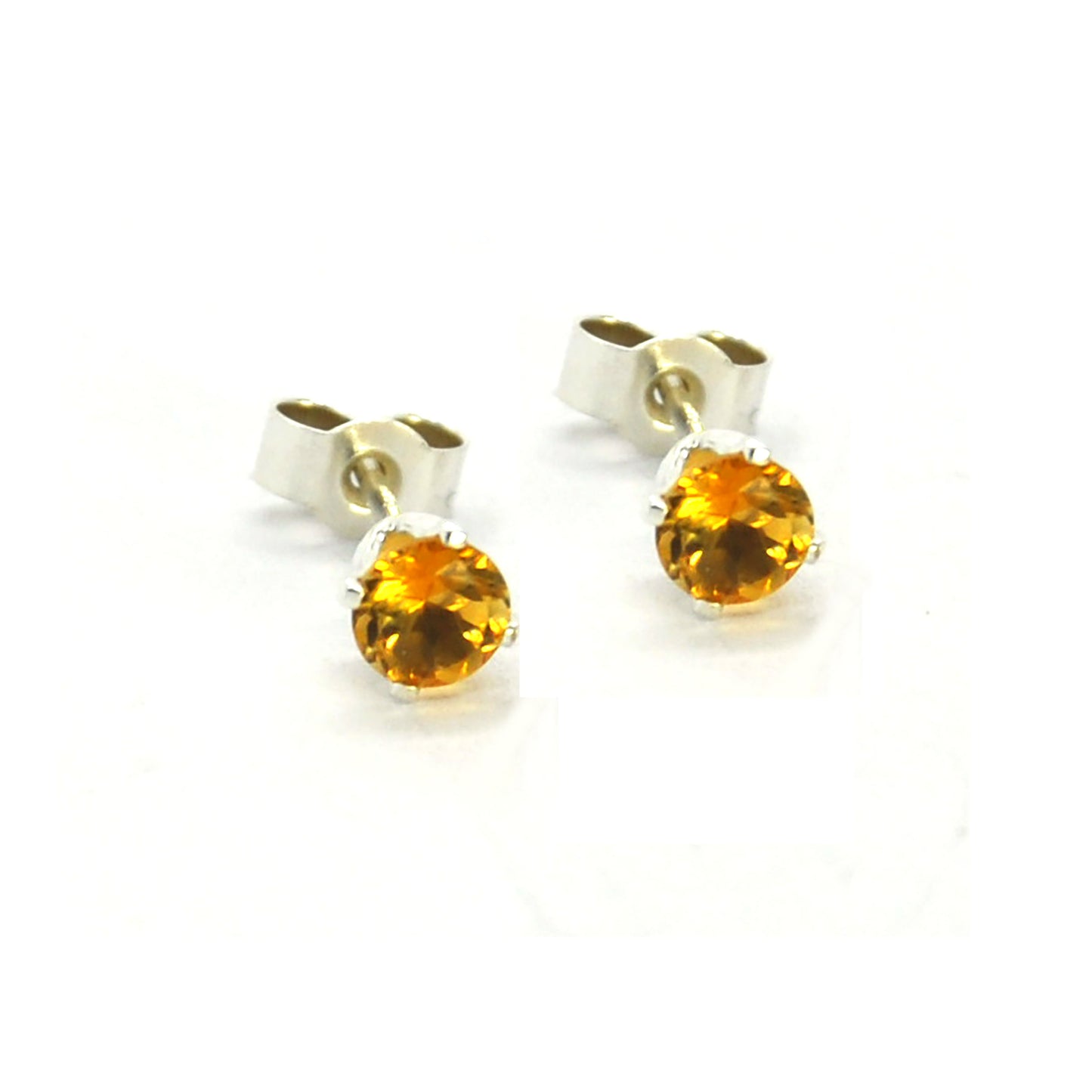 Silver 4 claw stud earrings with golden yellow citrine gemstones.