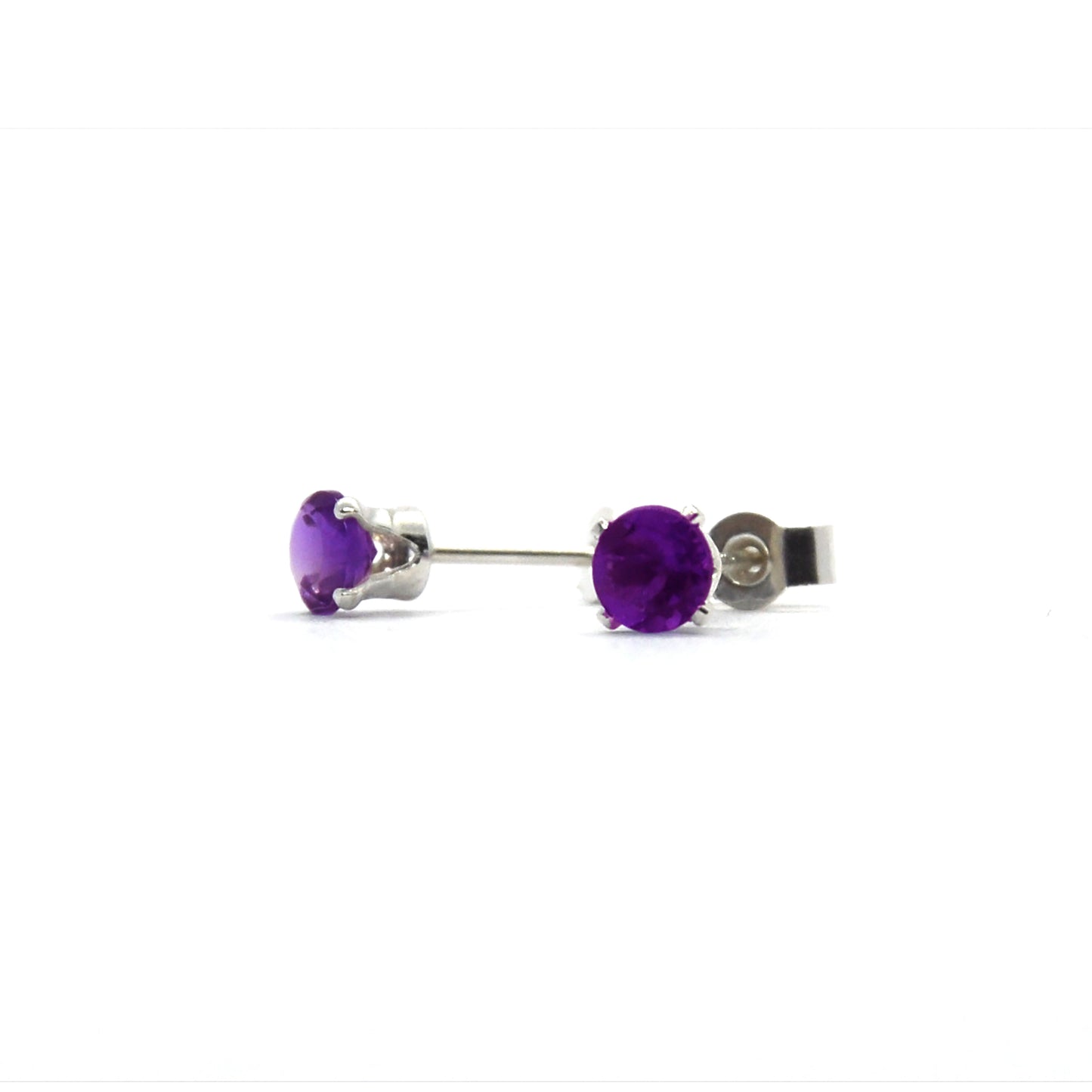 Silver 4 claw stud earrings set with purple amethyst gemstones.