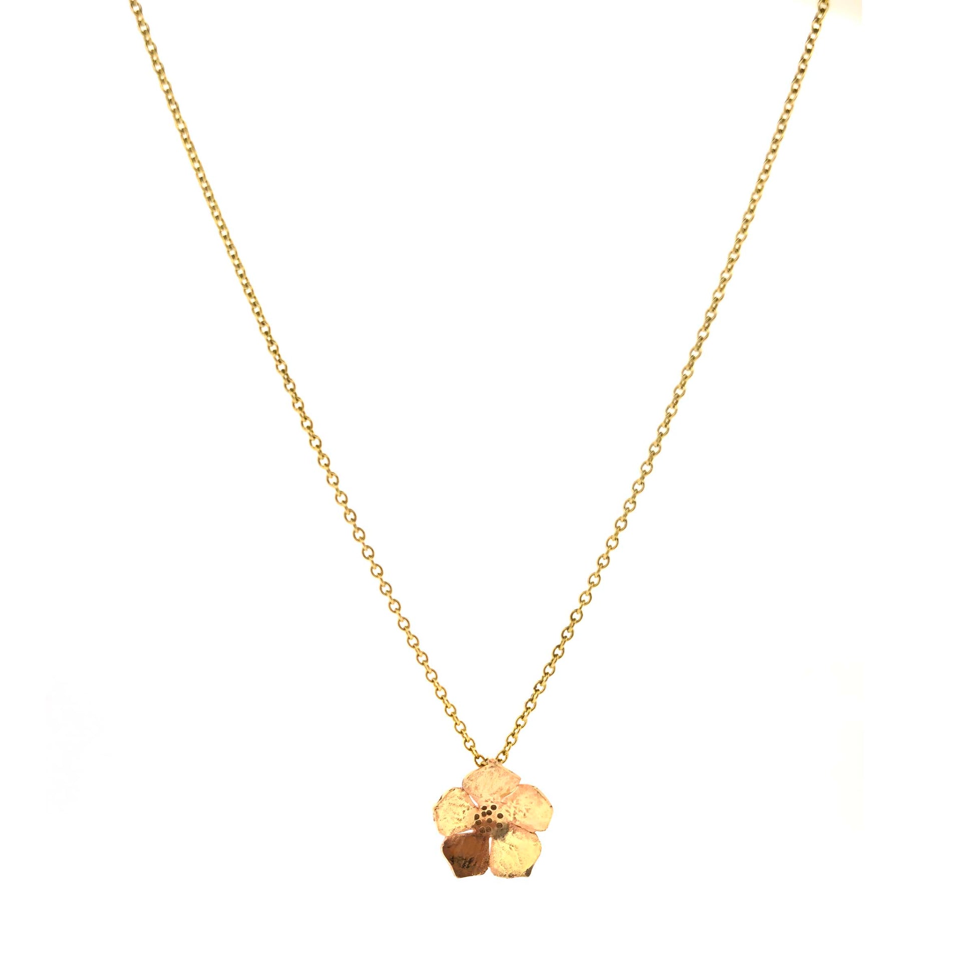 9ct yellow gold necklace chain with a flower pendant on a white background.