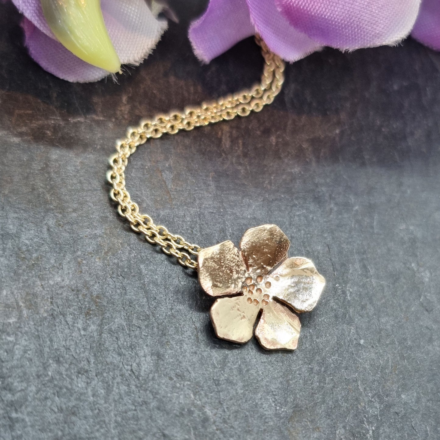 9ct yellow gold 5 petal flower pendant on chain with flowers