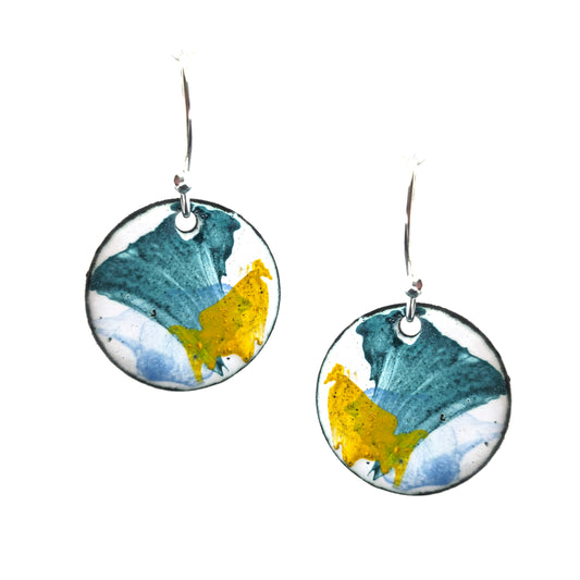 Round enamel drop earrings with splashes of blue, green and yellow on a white background. On silver ear hooks.