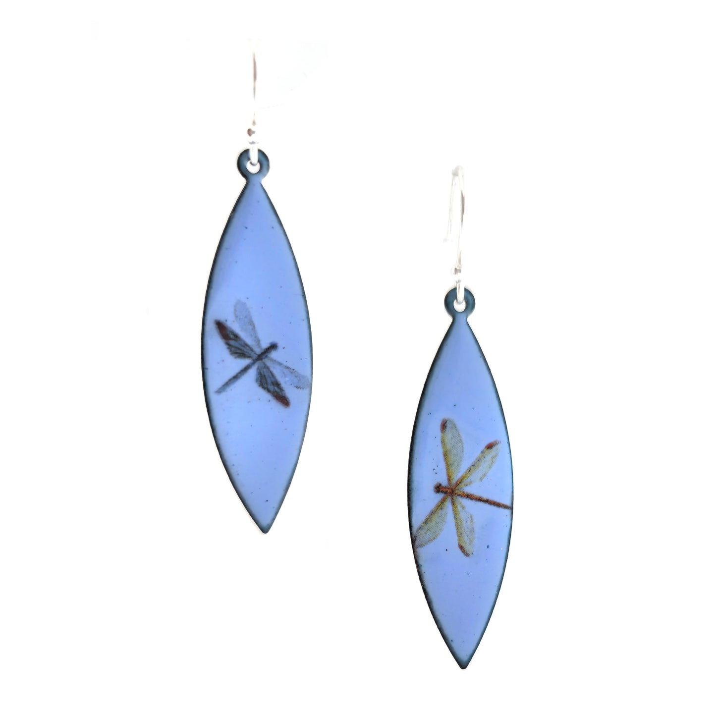 A pair of enamel earrings with different coloured dragonflies on a pale blue background. On silver ear hooks.