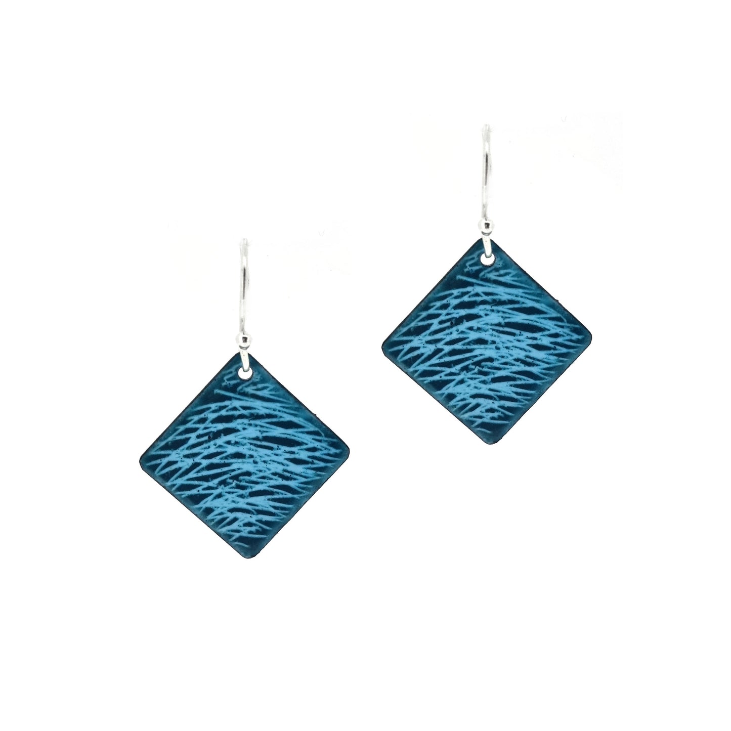 Square teal enamel earrings with lines of light blue enamel. On silver ear hooks.