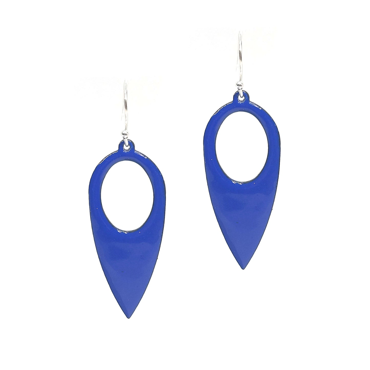 Large teardrop-shaped dark blue enamel drop earrings with a cut out circle.