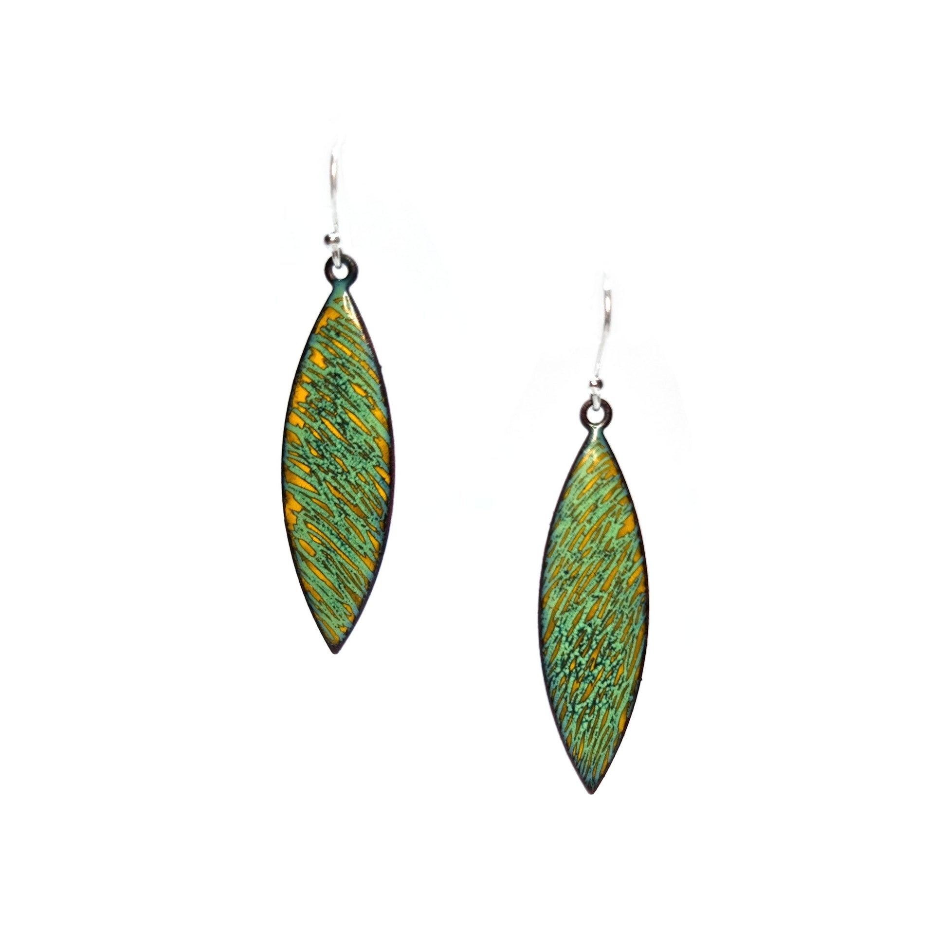 Boat shaped drop earrings with a rustic line pattern of light green and yellow enamel. With silver ear hooks.