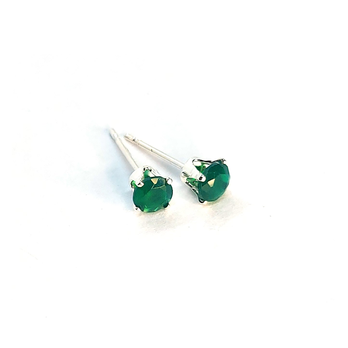 Silver 4 claw stud earrings with faceted green agate gemstones.