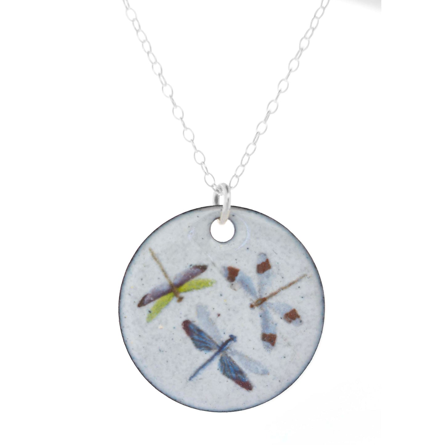 Necklace with a round enamel pendant featuring three dragonfly designs on a silver chain on a white background.