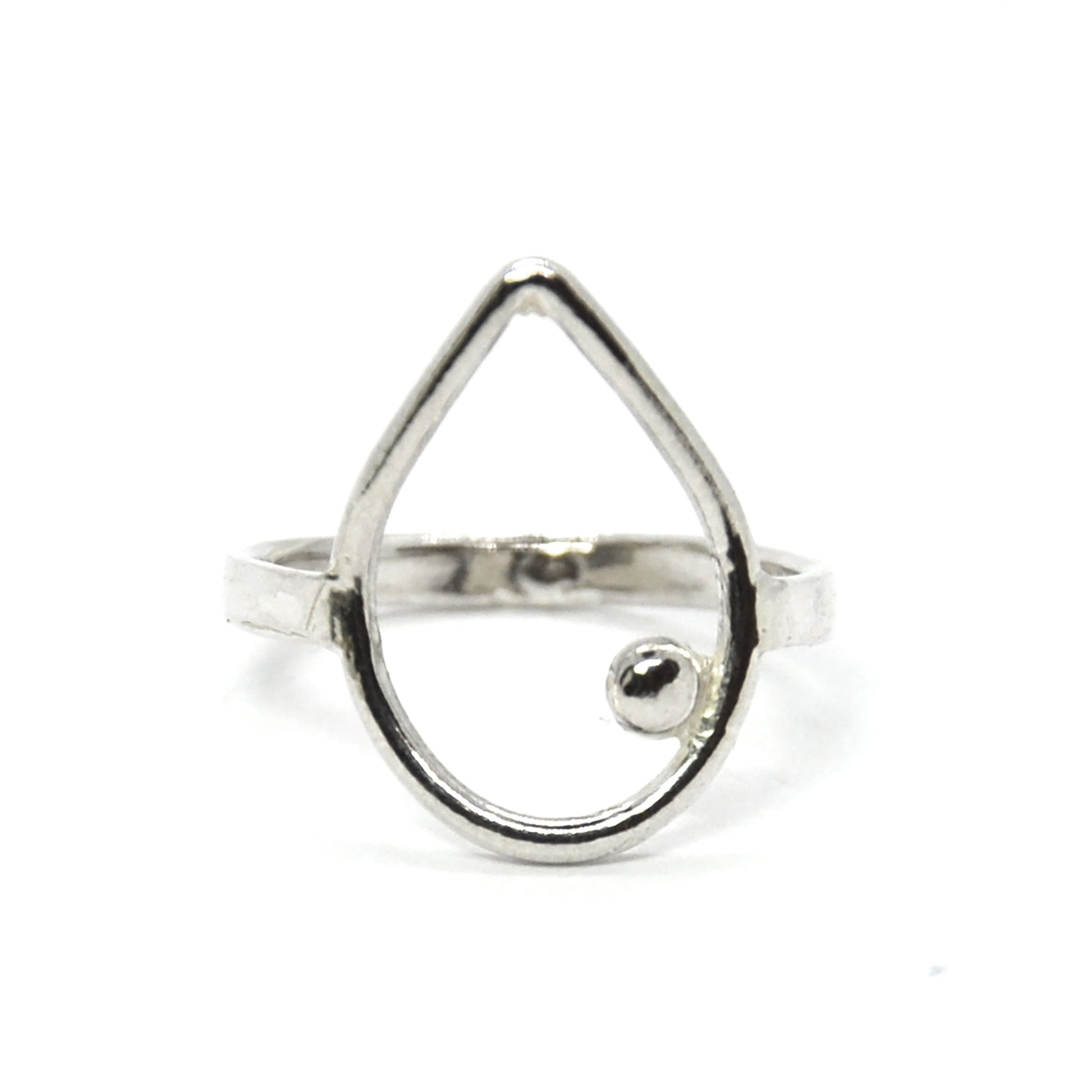 Silver open teardrop shaped ring with off-centre ball.