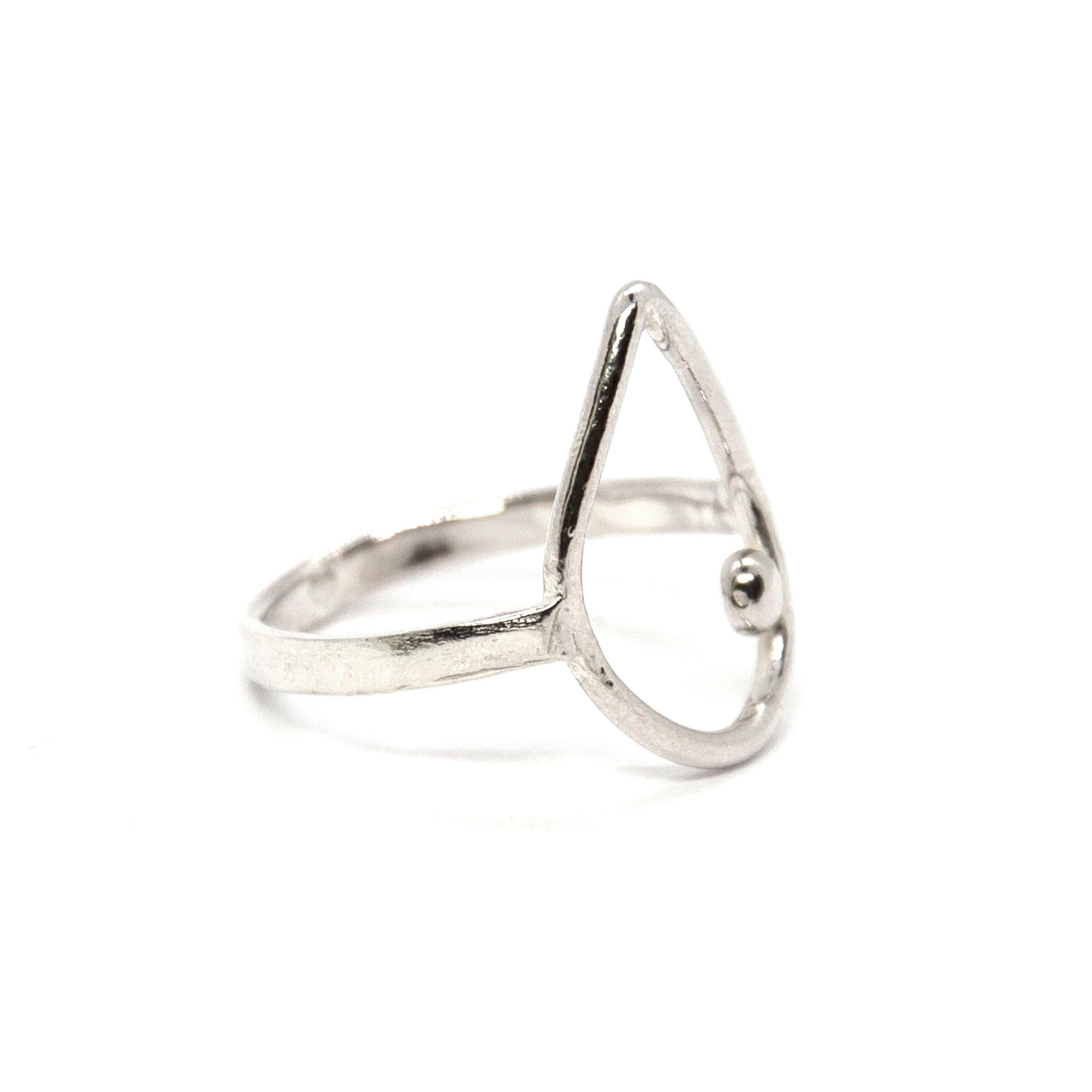 Silver open teardrop shaped ring with off-centre ball.