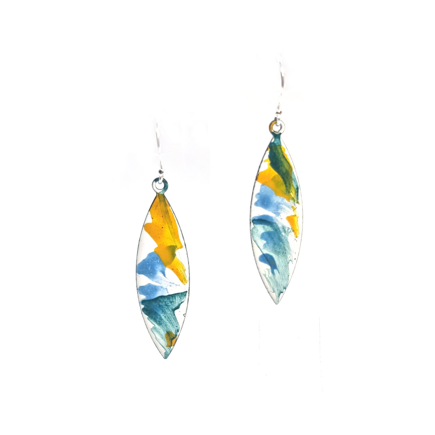 Navette shaped enamel drop earrings with green, blue and yellow splashes on a white background