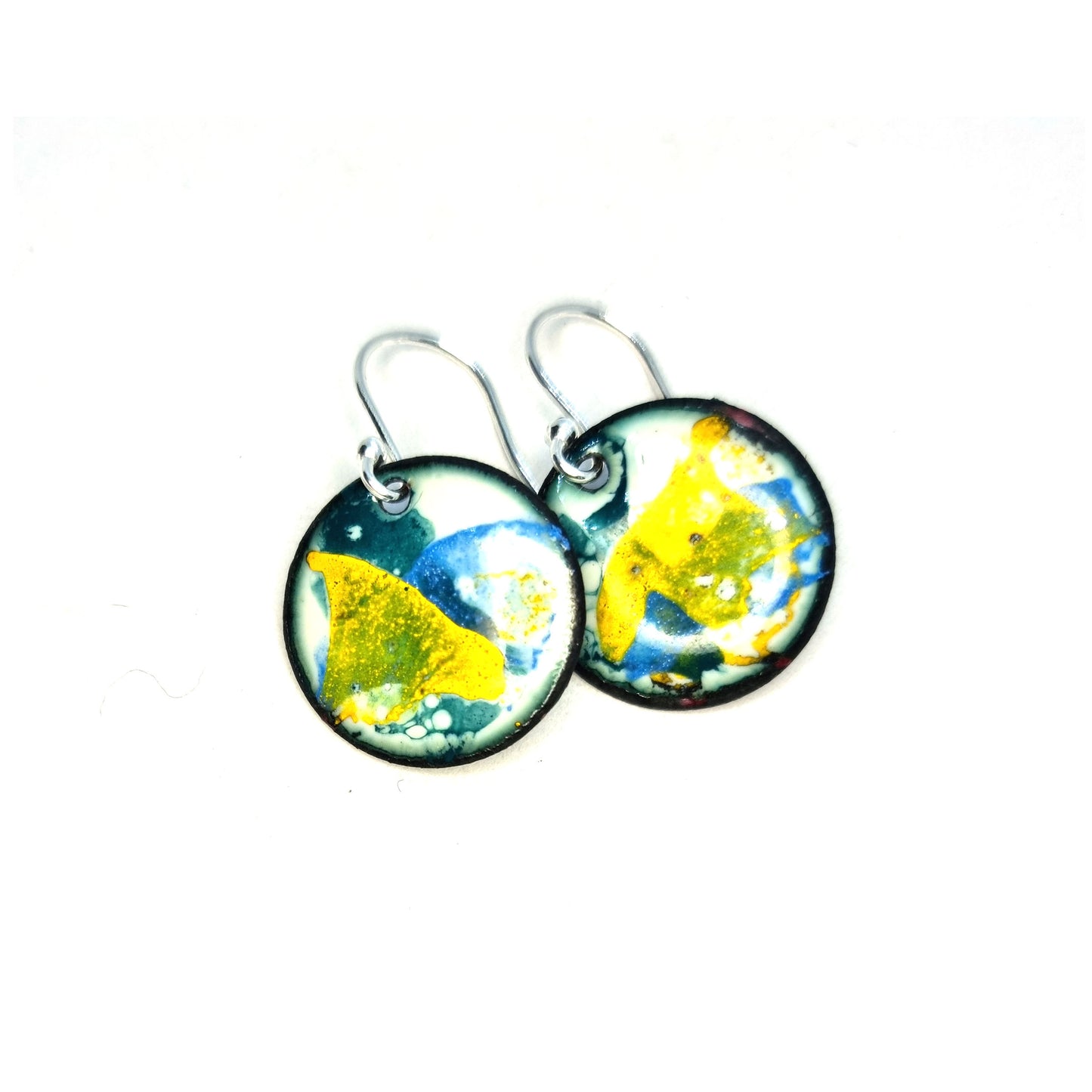 Round enamel drop earrings with splashes of blue, green and yellow on a white background.